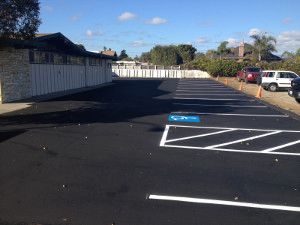 Newly paved parking lot with fresh white line markings