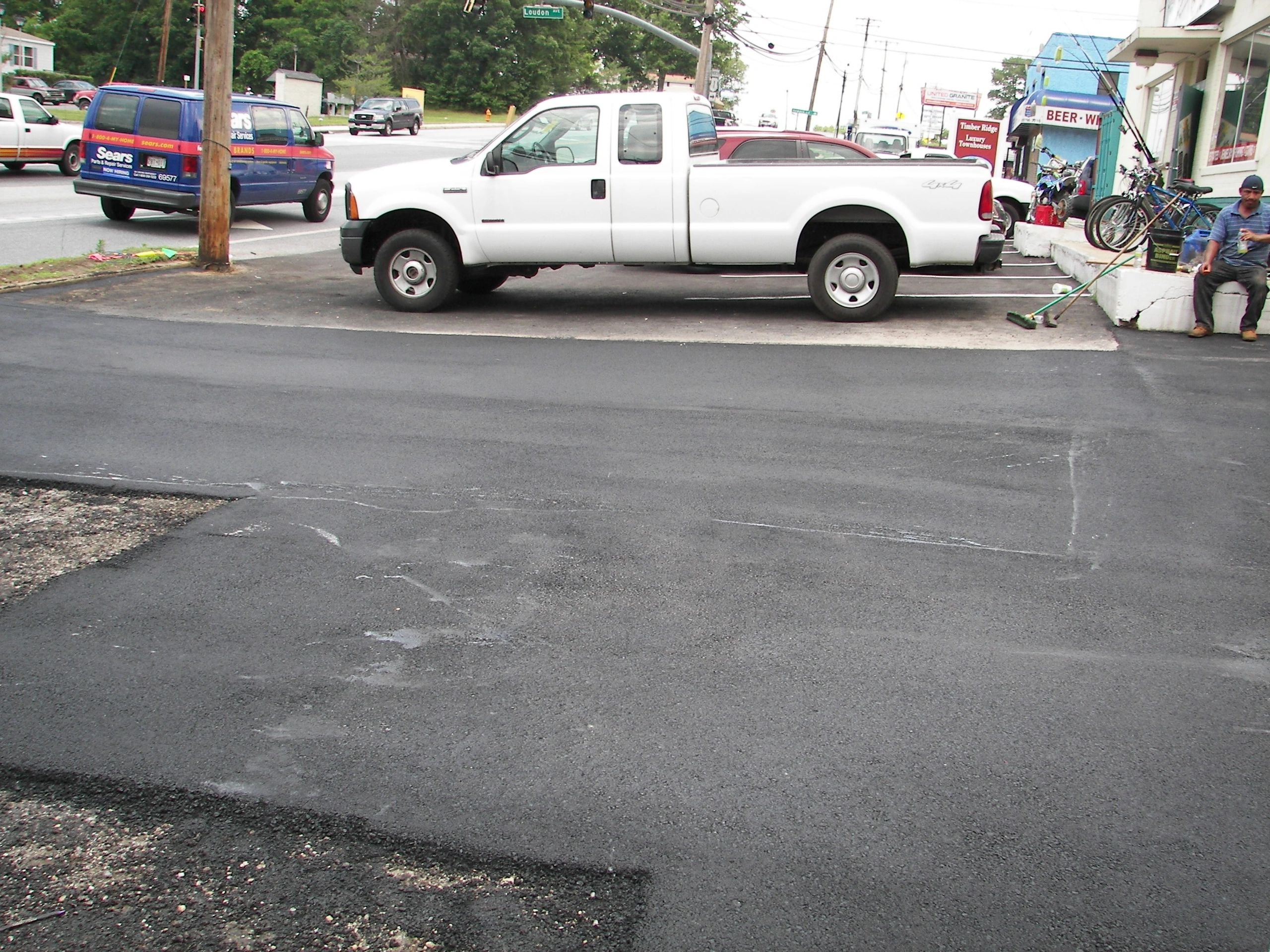Driveway sealcoating and paving